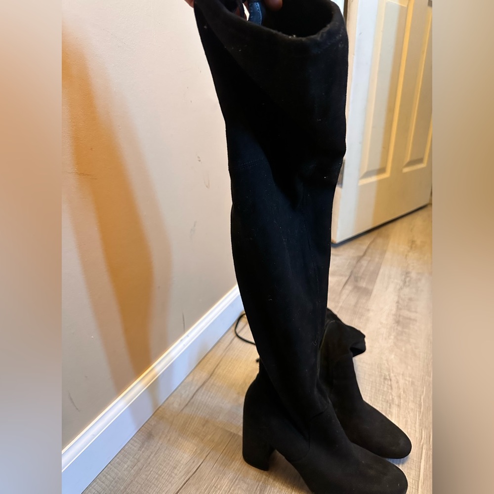 Over the knee black heeled boots